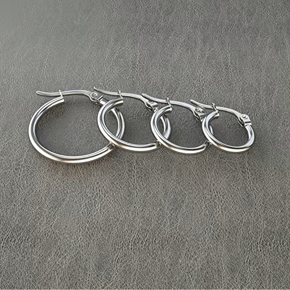 4 pair of Simple Hoop Earrings With Steel And Black For Men And Women. 4 sizes